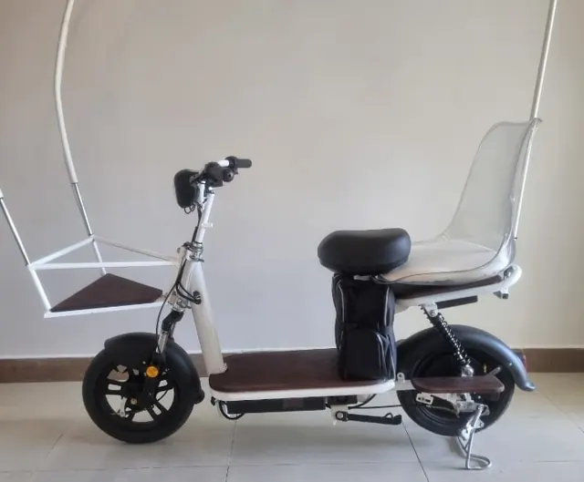 White e-bike with an extended cargo frame and seat